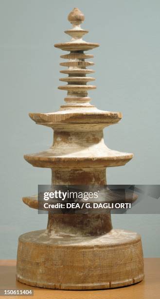 Exemplar of the million celebratory wooden pagodas commissioned by the Empress Koken, bearing a printing of Hyakumanto Darani Japan. Japanese...