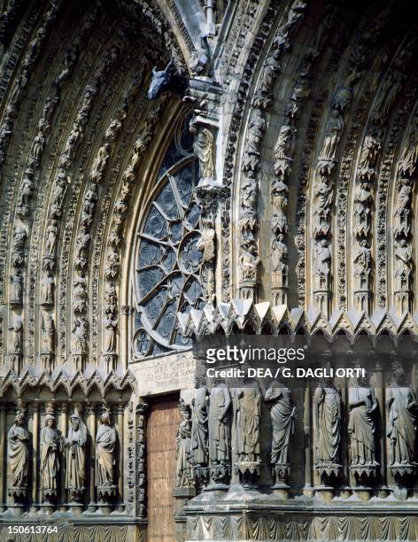 Detail of the decoration of the central door of the Cathedral of Notre-Dame , Reims. France, 13th century.