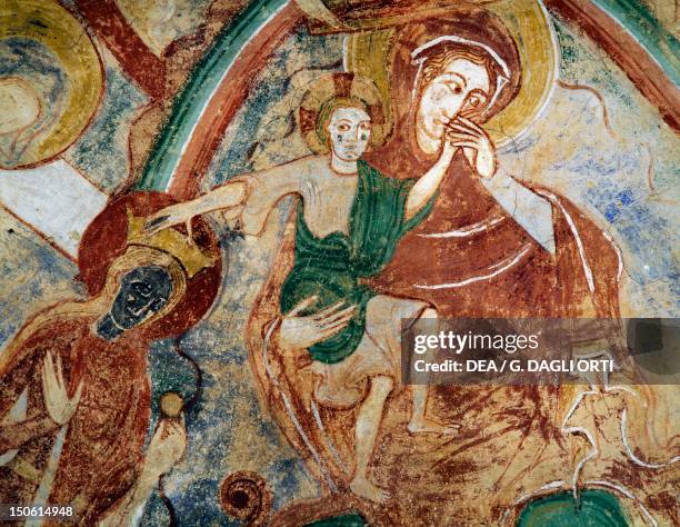 Virgin and Child with Catherine of Alexandria, 13th century Romanesque frescoes in St Catherine's Crypt, Church of Notre-Dame in Montmorillon, France.