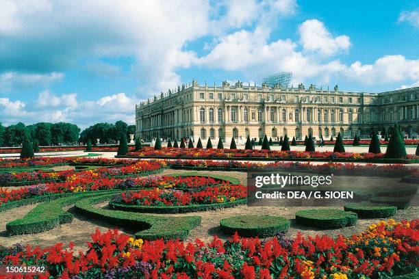 View of the Palace of Versailles from the Parterre du Midi . France.