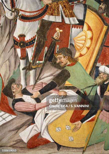 Soldiers gambling for Jesus' clothes by throwing dice, detail from The Crucifixion, fresco, by Giovanni Canavesio in the Notre-Dame des Fontaines...