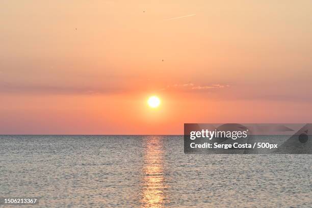 scenic view of sea against sky during sunset,france - sunset fotografías e imágenes de stock