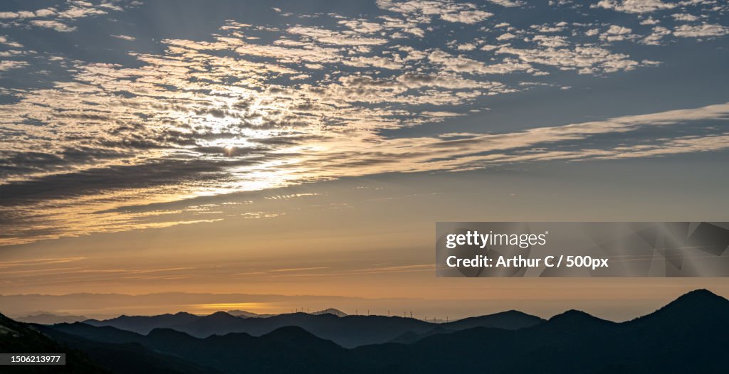 Scenic view of silhouette of mountains against sky during sunset,Japan