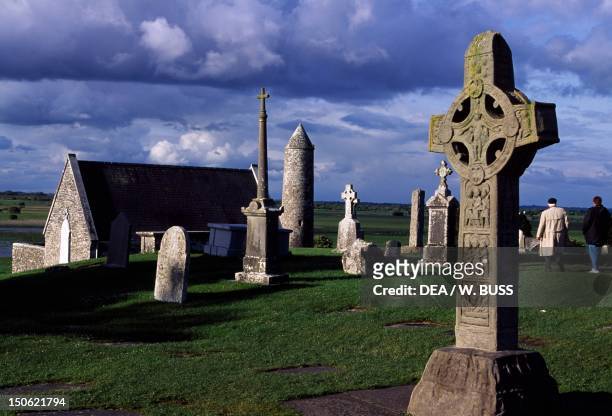 Monolithic high crosses in the monastic complex on the banks of the River Shannon, Clonmacnoise, Ireland.