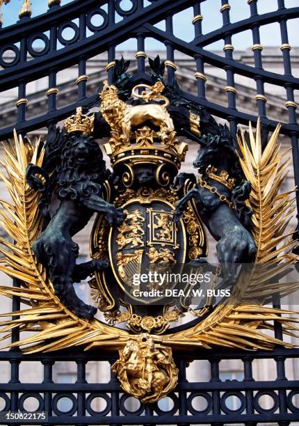 Royal crest, detail from the gate of Buckingham Palace, London. England.