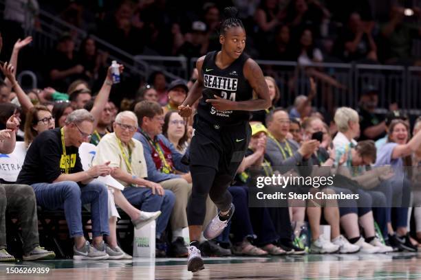 Jewell Loyd of the Seattle Storm reacts after her three point basket during the fourth quarter against the Minnesota Lynx at Climate Pledge Arena on...