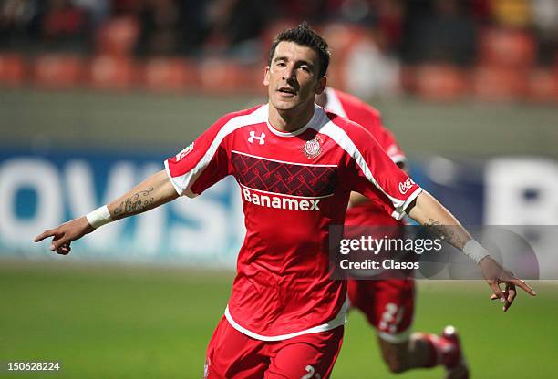 Player Edgar Benitez of Toluca celebrates a goal during a match between Toluca and Irapuato as part of the Copa MX 2012 at Estadio Nemesio Diez on...