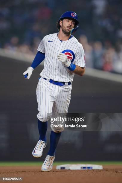 Dansby Swanson of the Chicago Cubs runs the bases against the Philadelphia Phillies at Wrigley Field on June 28, 2023 in Chicago, Illinois.