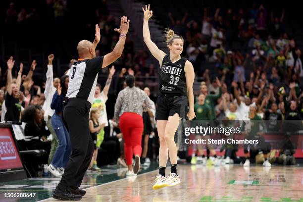 Sami Whitcomb of the Seattle Storm reacts after her three point basket in overtime against the Minnesota Lynx at Climate Pledge Arena on June 29,...