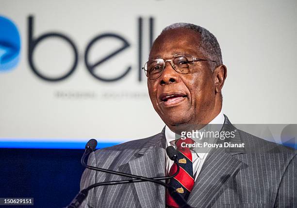 Hall of Famer Hank Aaron honors Bill Bartholomay for 50 Years in Baseball at the 2012 MLB Beacon Awards Luncheon presented by Belk during the Delta...