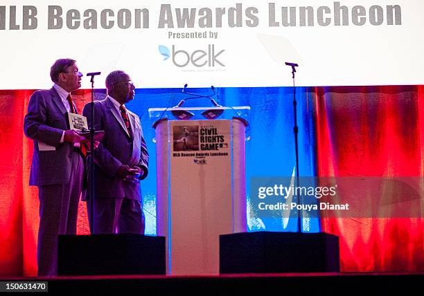 Commissioner Bud Selig and Hall of Famer Hank Aaron look on at the 2012 MLB Beacon Awards Luncheon presented by Belk during the Delta Civil Rights...