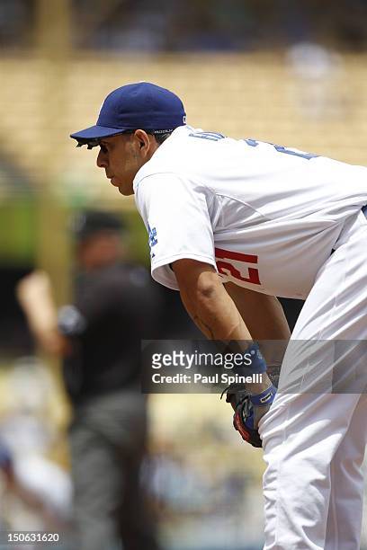 Juan Rivera of the Los Angeles Dodgers looks on during the game against the Philadelphia Phillies on Wednesday, July 18, 2012 at Dodger Stadium in...