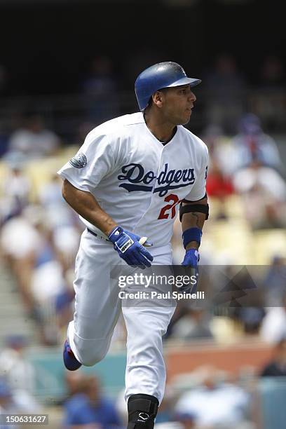 Juan Rivera of the Los Angeles Dodgers runs the bases after hitting a home run in the bottom of the second inning during the game against the...