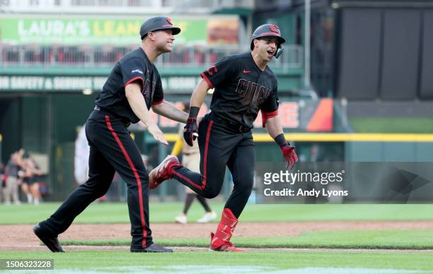 Spencer Steer of the Cincinnati Reds celebrates after hitting a 2 RBI home run in the 11th inning against the San Diego Padres at Great American Ball...