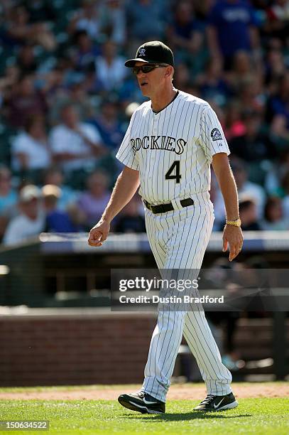 Jim Tracy of the Colorado Rockies walks towards the dugout in the eighth inning of a game against the Miami Marlins at Coors Field on August 19, 2012...