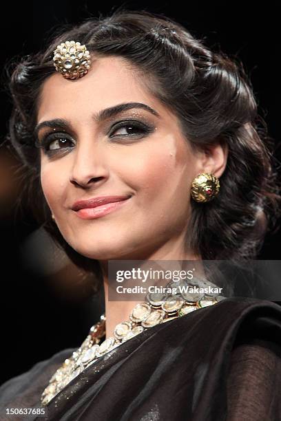 Sonam Kapoor walks the runway at the PCJ Grand Finale show of India International Jewellery Week 2012 day 5 at the Grand Hyatt on August 23, 2012 in...