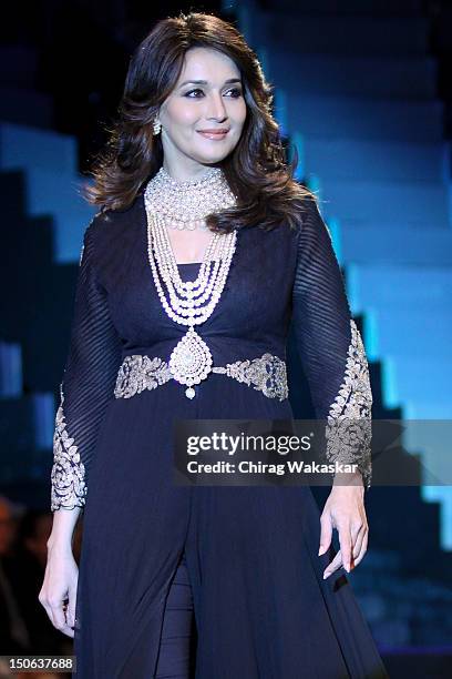 Madhuri Dixit walks the runway at the PCJ Grand Finale show of India International Jewellery Week 2012 day 5 at the Grand Hyatt on August 23, 2012 in...