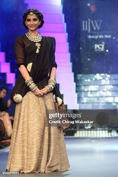 Sonam Kapoor walks the runway at the PCJ Grand Finale show of India International Jewellery Week 2012 day 5 at the Grand Hyatt on August 23, 2012 in...