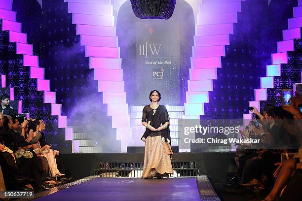 Sonam Kapoor walks the runway at the PCJ Grand Finale show of India International Jewellery Week 2012 day 5 at the Grand Hyatt on August 23, 2012 in...