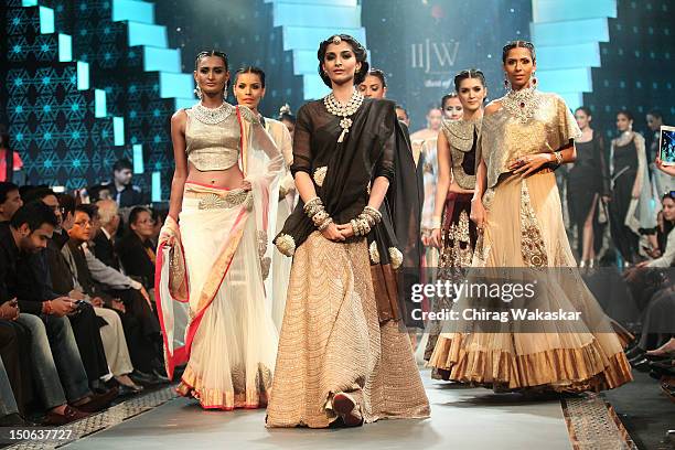 Sonam Kapoor walks the runway at the PCJ Grand Finale show of India International Jewellery Week 2012 day 5 at the Grand Hyatt on August 23, 2012 in...