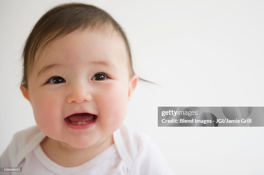 Smiling Asian baby girl