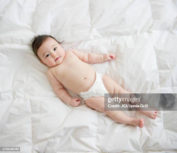 asian baby girl laying on blanket - one baby girl only stock pictures, royalty-free photos & images