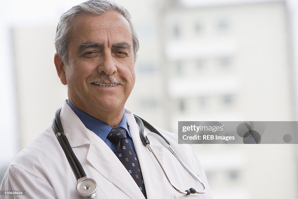 Smiling Hispanic doctor