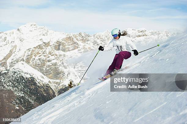 skier skiing on snowy slope - downhill bildbanksfoton och bilder