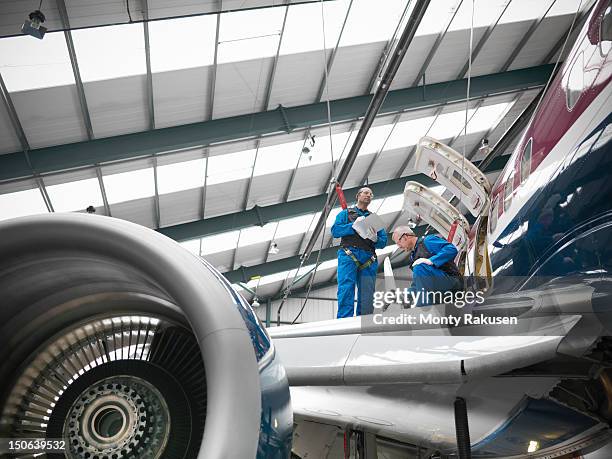 Flight Engineer Work 2,269 Fixed Wing Aircraft Stock Photos, High-Res Pictures, and Images ...