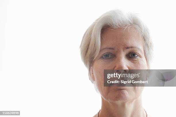 close up of older womans face - sigrid gombert stock-fotos und bilder