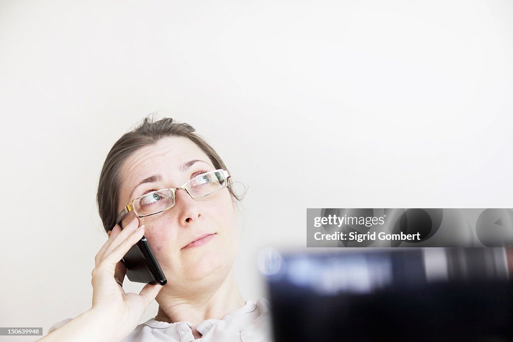 Businesswoman talking on cell phone