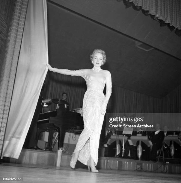 Marlene Dietrich performs on stage at the Sands Hotel and Casino Las Vegas, Nevada, 1953.