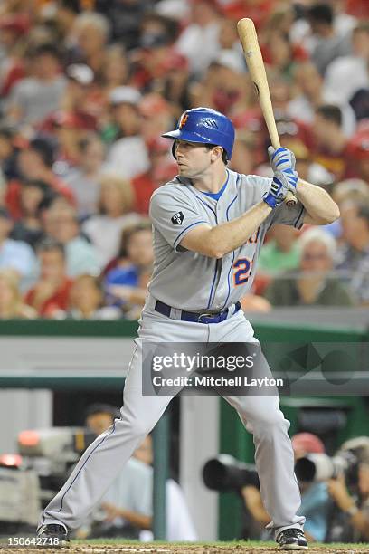 Mike Baxter of the New York Mets prepares for a pitch during a baseball game against the Washington Nationals on August 18, 2012 at Nationals Park in...