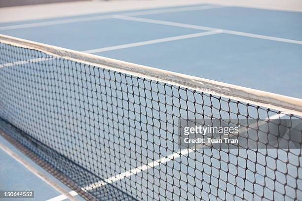 tennis court - tennis net fotografías e imágenes de stock