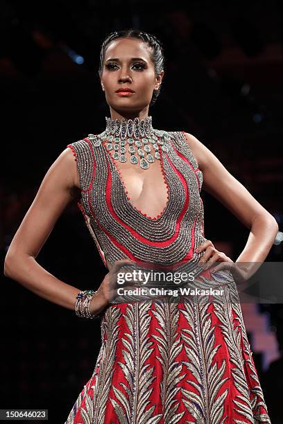 Model walks the runway at the PCJ Grand Finale show of India International Jewellery Week 2012 day 5 at the Grand Hyatt on August 23, 2012 in Mumbai,...