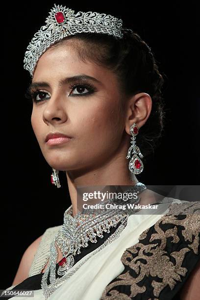 Model walks the runway at the PCJ Grand Finale show of India International Jewellery Week 2012 day 5 at the Grand Hyatt on August 23, 2012 in Mumbai,...