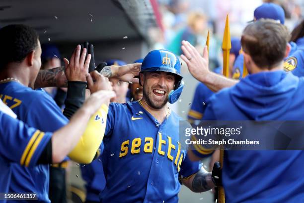 Tom Murphy of the Seattle Mariners reacts after his two-run home run during the second inning against the Tampa Bay Rays at T-Mobile Park on June 30,...