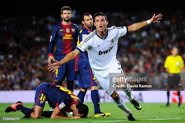 Cristiano Ronaldo of Real Madrid CF celebrates after scoring the opening goal during the Super Cup first leg match between FC Barcelona and Real...