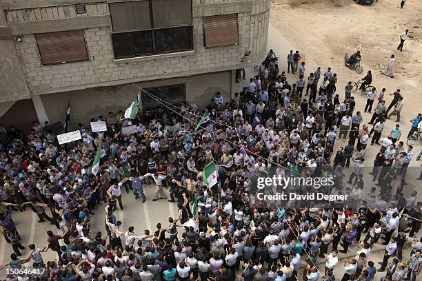 In the suburb of Arabaeen a protest of hundreds filled a street after friday prayers, May 18, 2012. Peaceful protests of this kind took place in many...