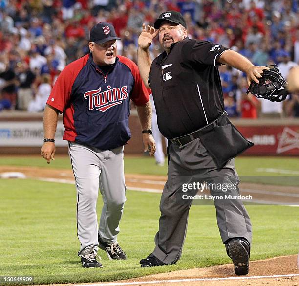 Manager Ron Gardenhire of the Minnesota Twins is ejected by home plate umpire Wally Bell after arguing about his pitcher Scott Diamond being ejected...