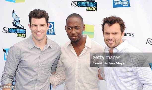 Max Greenfield, Lamorne Morris and Jake M. Johnson arrive at the 2012 Do Something Awards at Barker Hangar on August 19, 2012 in Santa Monica,...