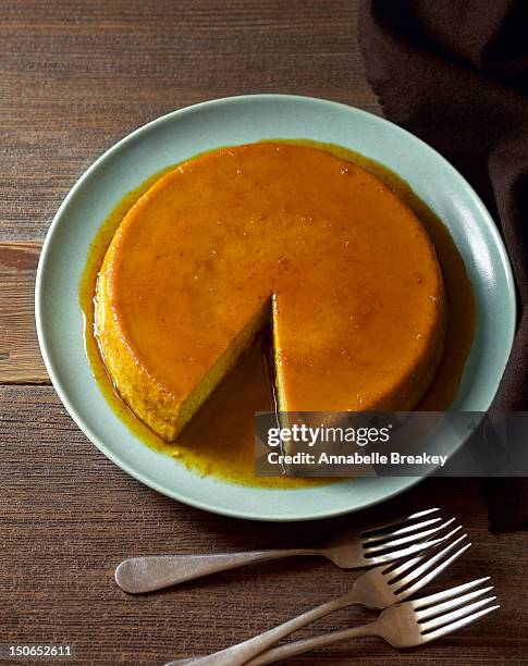 carmelized orange pumpkin flan - flan stock pictures, royalty-free photos & images