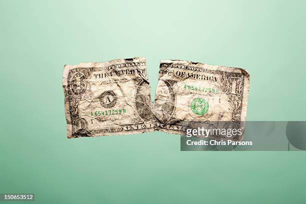 crumpled up and torn dollar bill - banconota da 1 dollaro statunitense foto e immagini stock