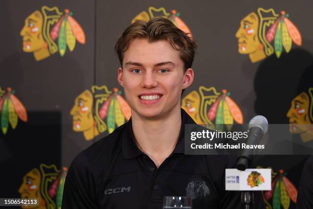 Connor Bedard of the Chicago Blackhawks answers questions from the media during a introductory press conference at Fifth Third Arena on June 30, 2023...