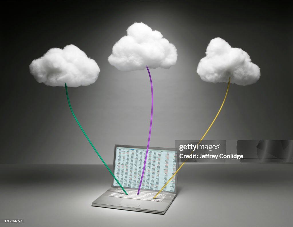 Three Clouds Connected to Laptop