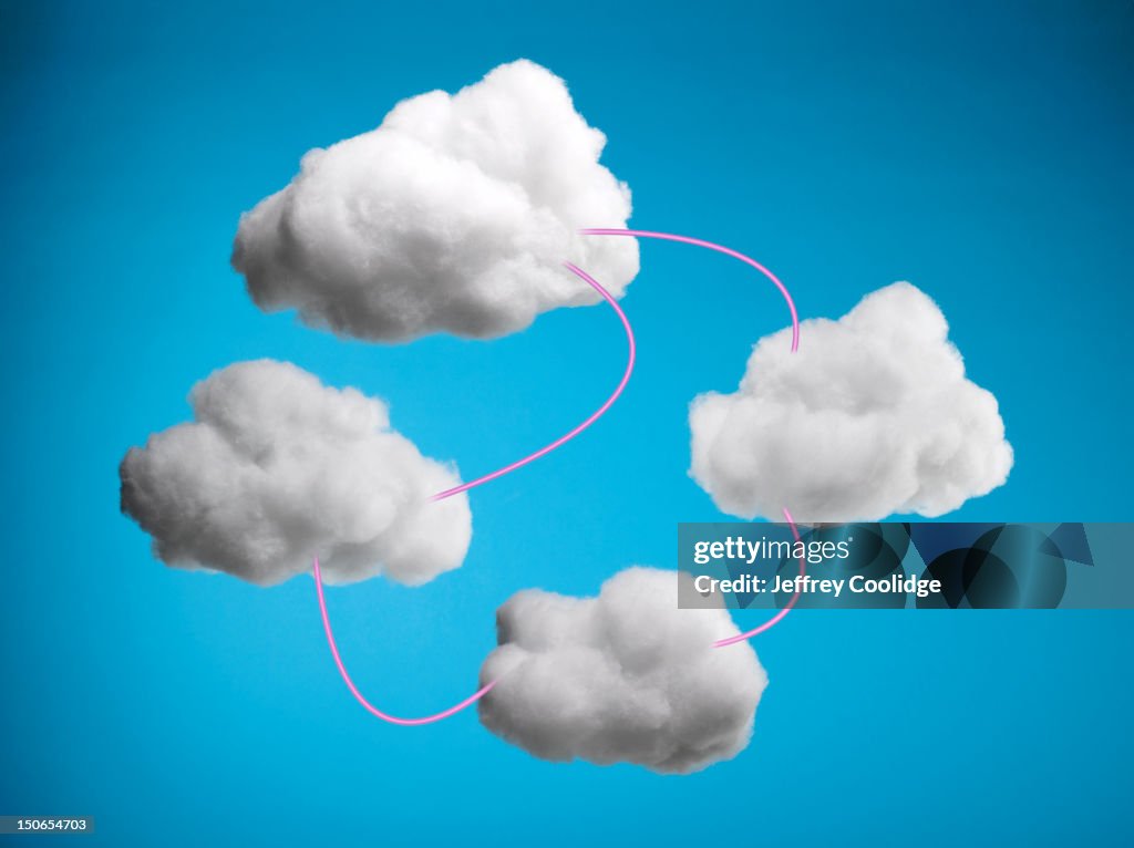 Four Clouds Connected by Pink Wires