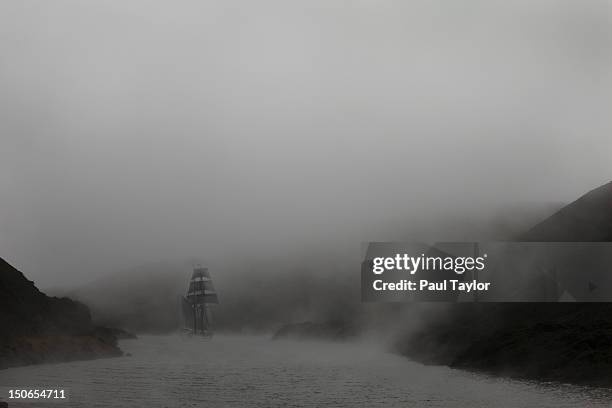Ship In Foggy Channel High-Res Stock Photo