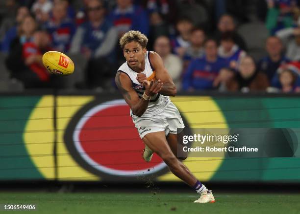 Liam Henry of the Dockers handballs during the round 16 AFL match between Western Bulldogs and Fremantle Dockers at Marvel Stadium, on July 01 in...