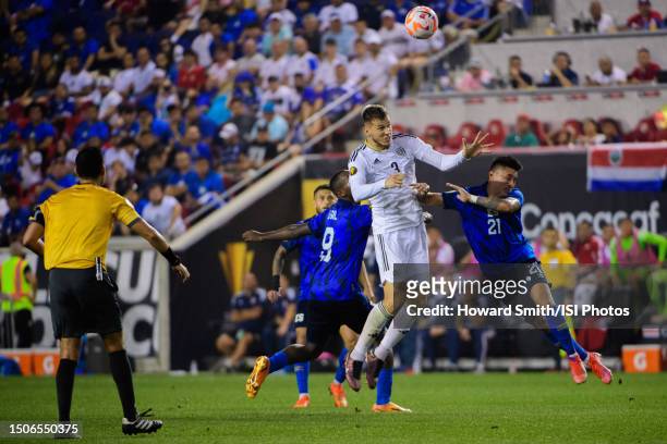 Juan Pablo Vargas of Costa Rica goes up for a header with Bryan Tamacas of El Salvador during the second half of a 2023 Concacaf Gold Cup Group C...