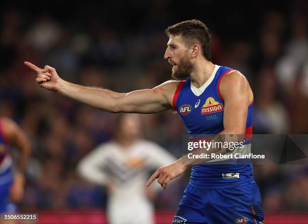Marcus Bontempelli of the Bulldogs celebrates after scoring a goal during the round 16 AFL match between Western Bulldogs and Fremantle Dockers at...